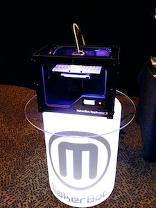 Makerbot Replicator 2 on glowing pedestal